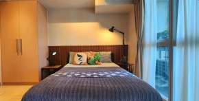 Pristine & Cozy Stay at Uptown Mall BGC across Mitsukoshi with FREE Parking